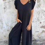 Carla - Macacão Estampado de Leopardo e Bolsos Frontais