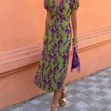 Caroline - Vestido com decote V  e mangas bufantes