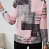 Camisola geométrica Kendra com fecho elegante