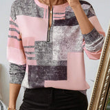 Camisola geométrica Kendra com fecho elegante