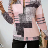 Camisola geométrica Kendra com fecho elegante