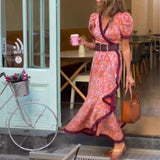Mara - Vestido elegante com mangas bufantes e saia assimétrica