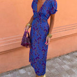 Caroline - Vestido com decote V  e mangas bufantes