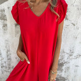 Carla - Macacão Estampado de Leopardo e Bolsos Frontais