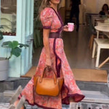 Mara - Vestido elegante com mangas bufantes e saia assimétrica