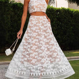 Conjunto elegante de top curto com estampado de palmeiras e saia longa