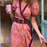Mara - Vestido elegante com mangas bufantes e saia assimétrica