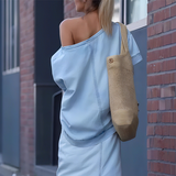 Conjunto feminino Denim com top assimétrico e saia longa