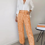 Conjunto Helena sofisticado com camisa leve e calças estampadas