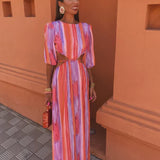 Carlota - Vestido longo elegante com mangas curtas bufantes e design aberto nas costas