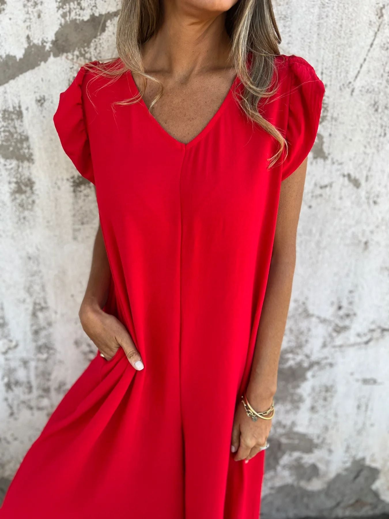 Carla - Macacão Estampado de Leopardo e Bolsos Frontais