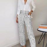 Conjunto Helena sofisticado com camisa leve e calças estampadas