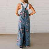 Macacão jeans floral Elara leve e descontraído