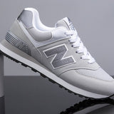 Ténis NB® - Cinza / Branco