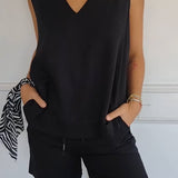 Nellie | Top elegante sem mangas com decote em V
