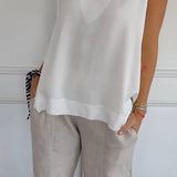 Nellie | Top elegante sem mangas com decote em V