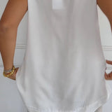 Nellie | Top elegante sem mangas com decote em V